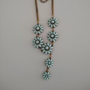 Blue flower necklace.